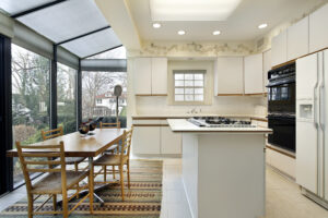 Kitchen with island and sliding doors to patio